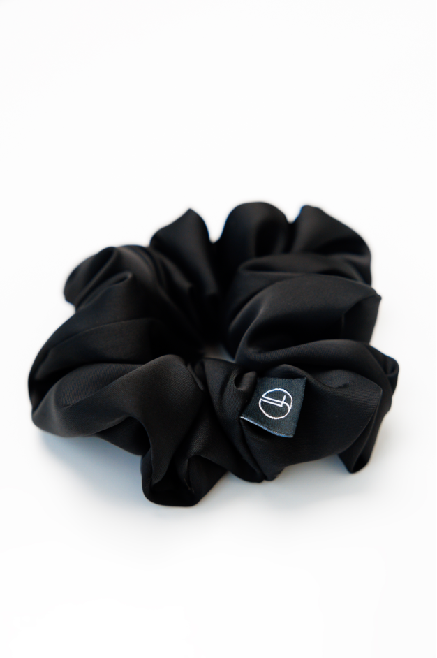 Резинка ручної роботи для волосся у чорному кольорі